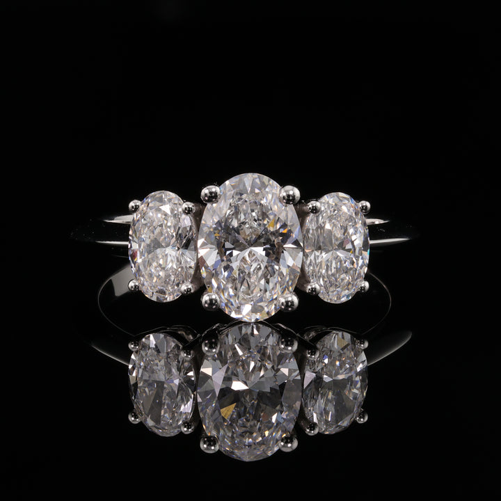 Triple Oval Solitaire Ring with Oval Sidestones in 18K White Gold